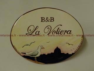 cod.art: bb34 - Mattonella ovale in ceramica, realizzata su misura e con decoro e scritte personalizzate in base alla richiesta del cliente . 